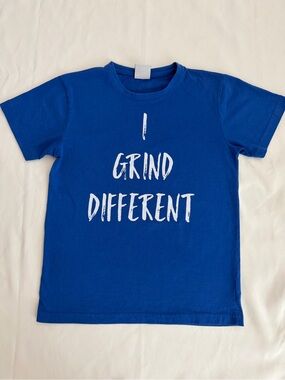 NG Royal Blue Graphic Women Tee with White 'I Grind Different' Text sz M. T023